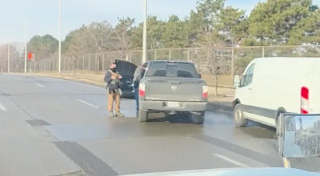 Masked ICE agents outside of Factory Zero (Source: Reddit)